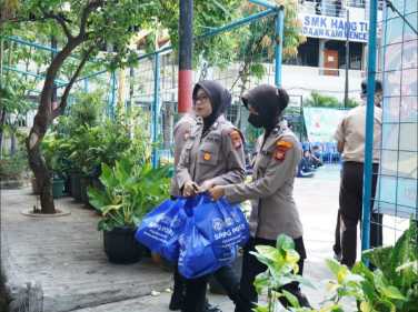 Polisi Distribusikan 1.377 Paket Makan Bergizi Gratis ke Ribuan Pelajar di Jakarta Utara
